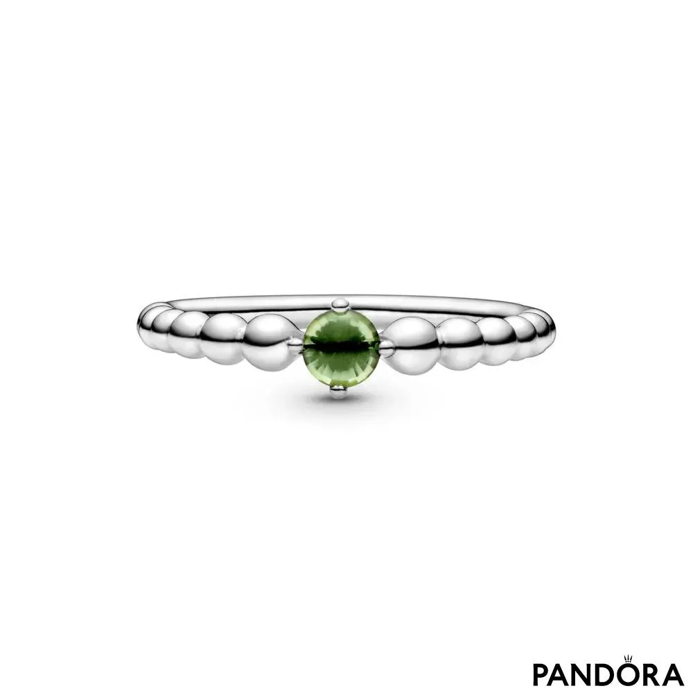 Prstan iz niza perlic v svetlo zeleni barvi 